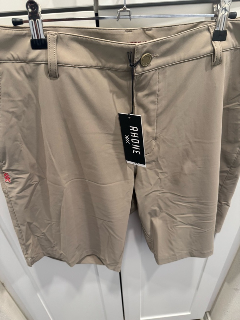 RHONE Men's Stone Performance Shorts with Branded Button